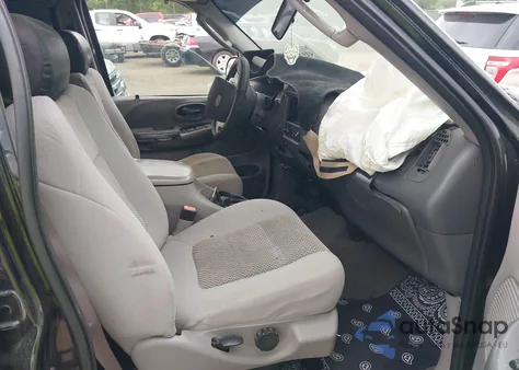 2003 Ford F-150 Lariat/Xlt z USA, uszkodzony, nr VIN 1FTRW08L83KD28764